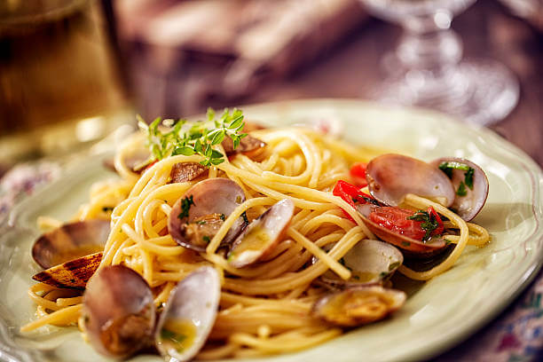 Delicious homemade Spaghetti Vongole with garlic, chili, parsley and white wine served on a plate