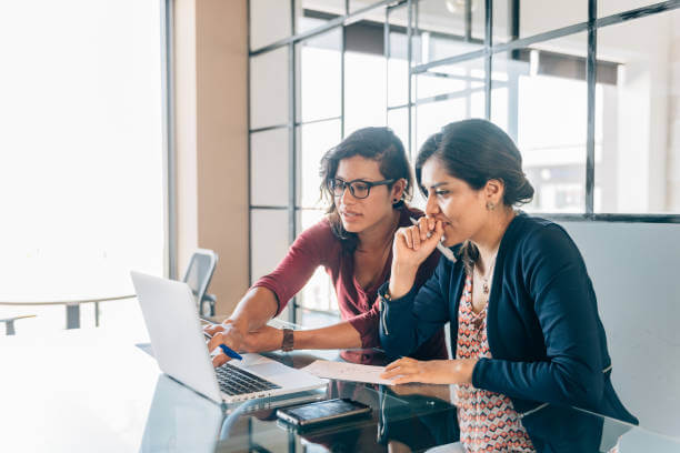 Mexican businesswoman meeting in office