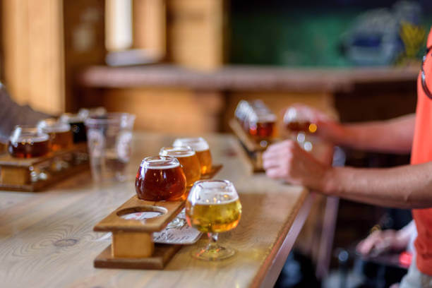 Variety of beer samples on the table at local microbrewery tasting room