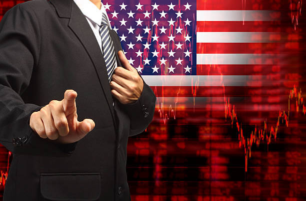 Crisis in USA - Shares Fall Graph on United States of America Flag with Business man pushing on a touch screen interface analyze solution ideas concept design