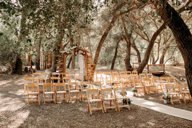 Vintage rustic venue in eucalyptus forest.  Rustic wooden outdoor ceremony.